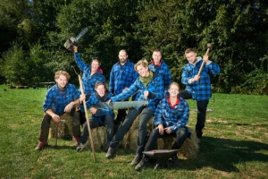 team posing with forest tools during the Forest Games