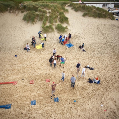 aerial view of the teams participating in an event during the Beach Olympics
