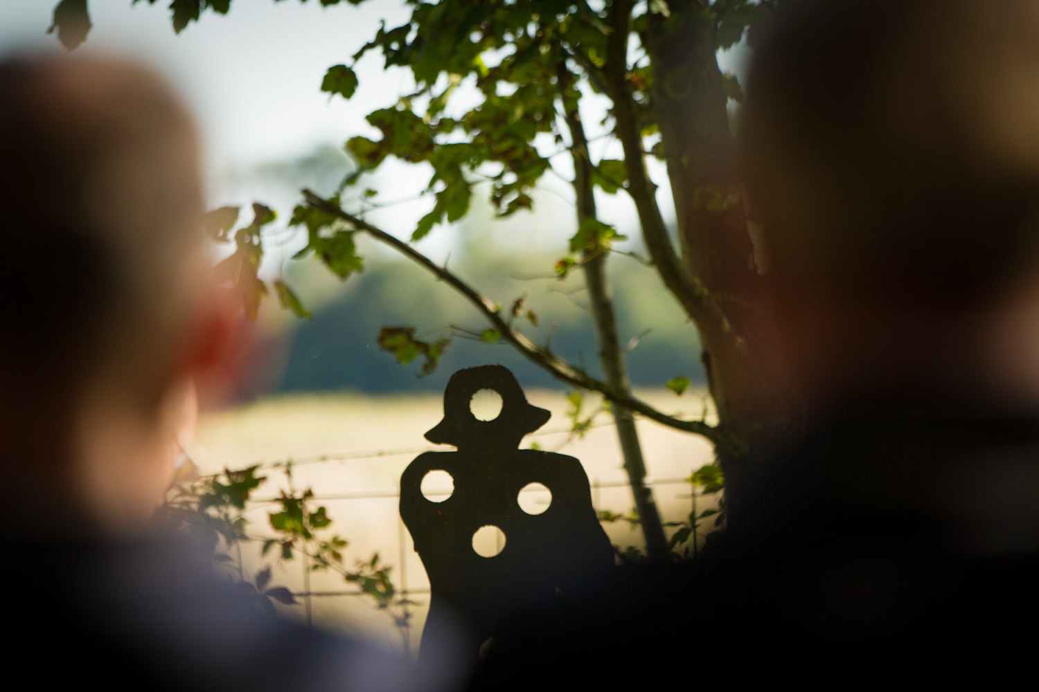 silhouettes in front of a shooting target from the Castle Survey