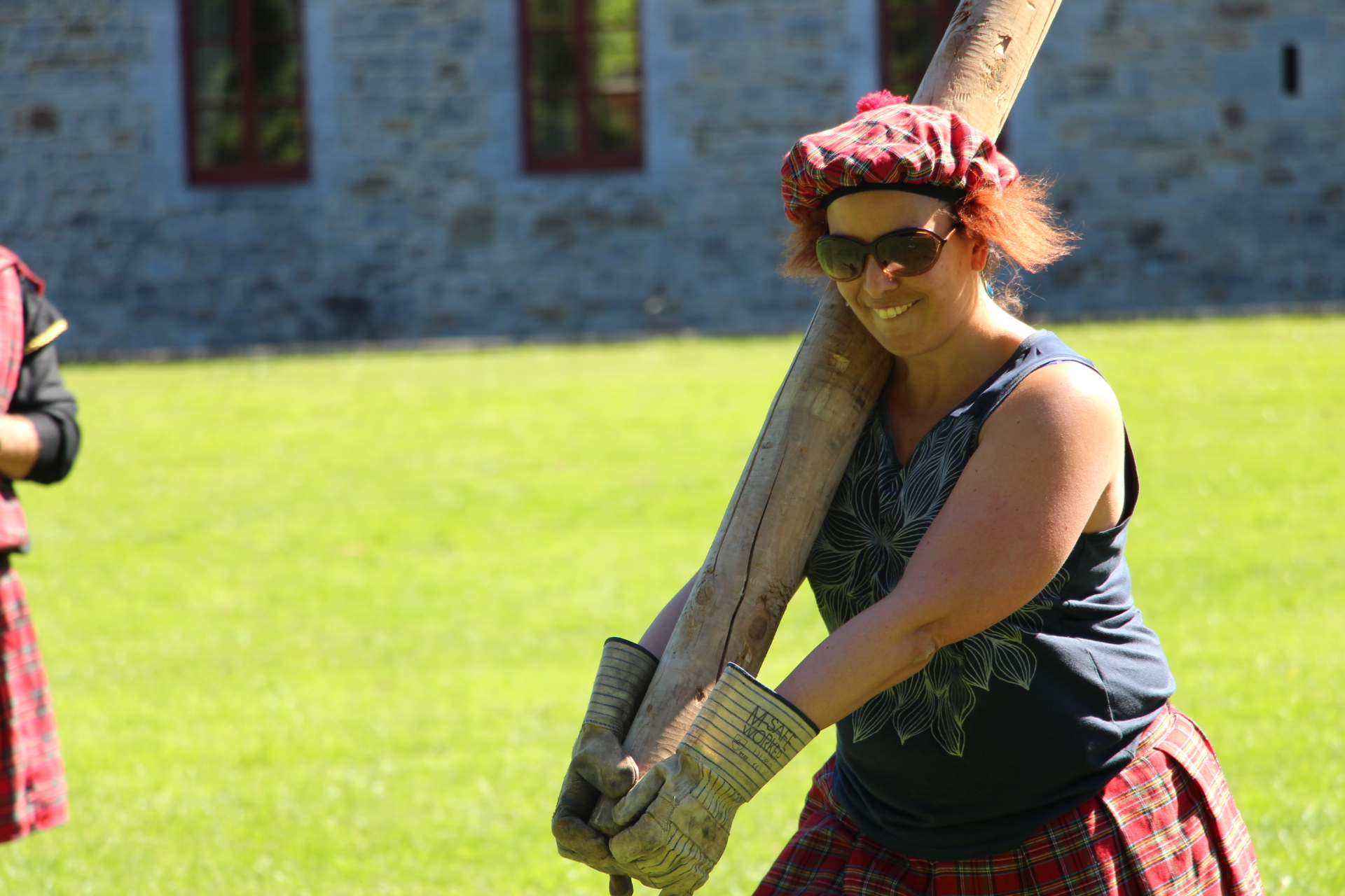 participant ready to throw a log for a Highland Games challenge